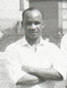A black and white photo of an Afro-Caribbean cricketer
