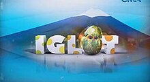 An image of an egg, with a volcano on the background. The series title is displayed on the center of the image.