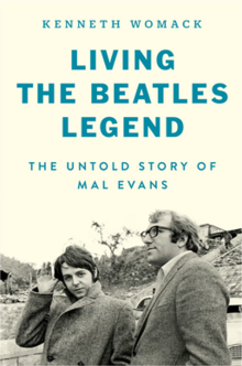 The text "Kenneth Womack Living the Beatles Legend: The Untold Story of Mal Evans" above a picture of Mal Evans and Paul McCartney