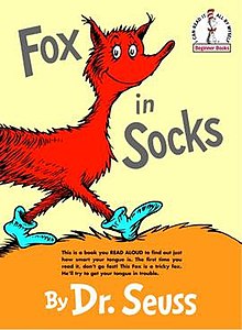 Book cover of a cartoon fox wearing socks. Below the fox is small black text that reads: "This is a book you read aloud to find out just how smart your tongue is. The first time you read it, don't go fast! The fox is a tricky fox. He'll try to get your tongue in trouble."