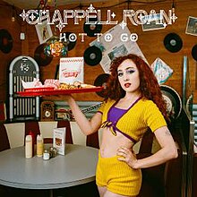 The cover artwork of "Hot to Go!". The cover features Roan in a yellow and purple outfit posing as an American diner worker, serving a tray of food.