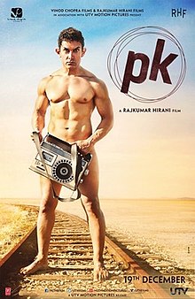 Aamir Khan, as the title character PK, stands nude on the railroad tracks, looking into the camera while obscuring his genitals with a transistor radio.